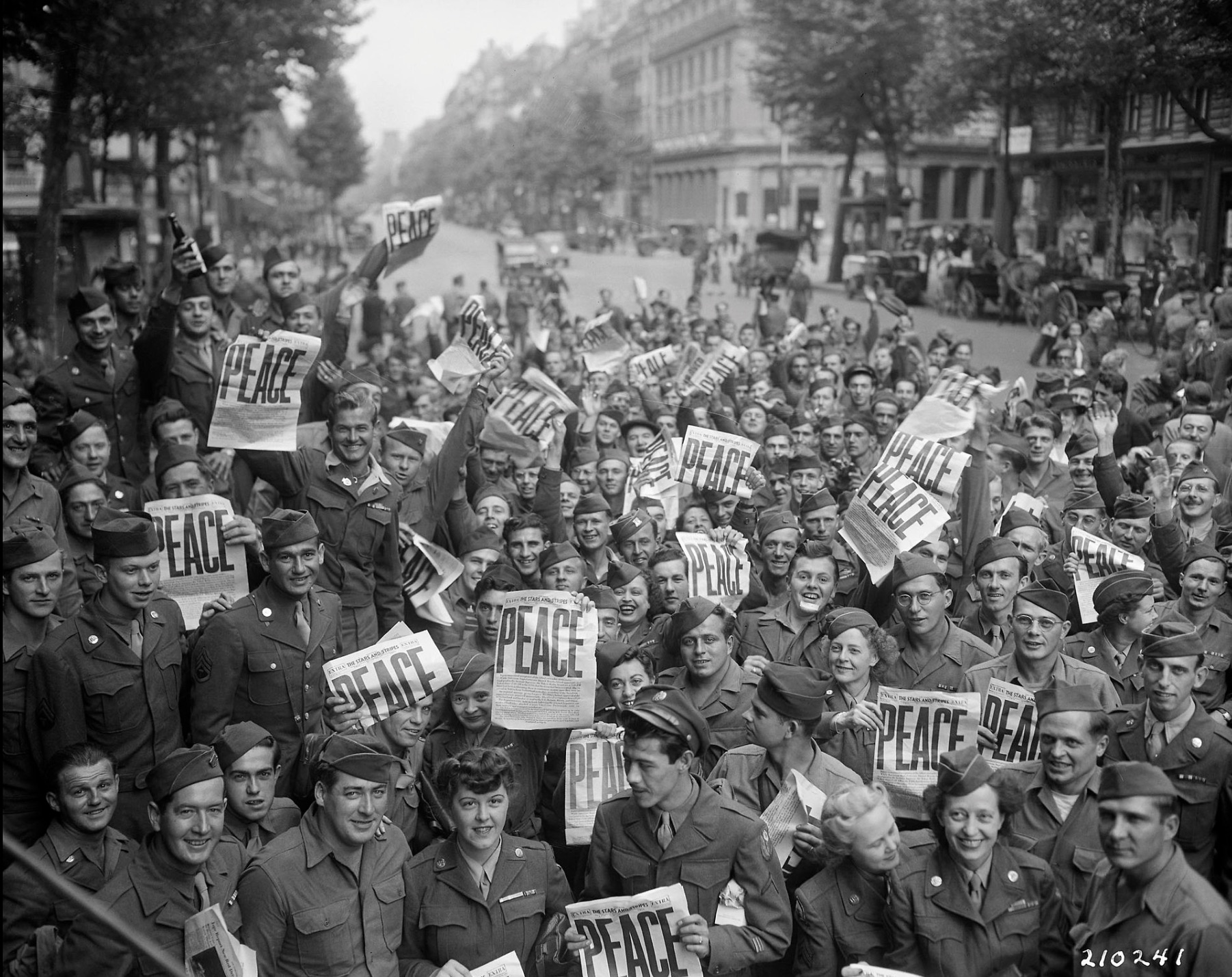 Allied military personnel in Paris celebrating V-J Day 